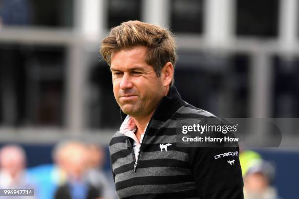 Robert Rock of England reacts to a putt on hole eighteen during day one of the Aberdeen Standard Investments Scottish Open at Gullane Golf Course on...