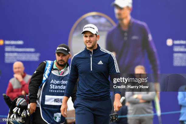 Bradley Neil of Scotland reacts to a putt on hole eighteen during day one of the Aberdeen Standard Investments Scottish Open at Gullane Golf Course...