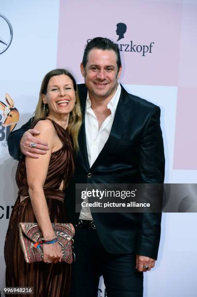 Singer Sascha Vollmer and his wife Jenny arrive at the charity gala 'Tribute to Bambi' in Berlin, Germany, 5 October 2017. Photo: Gregor Fischer/dpa