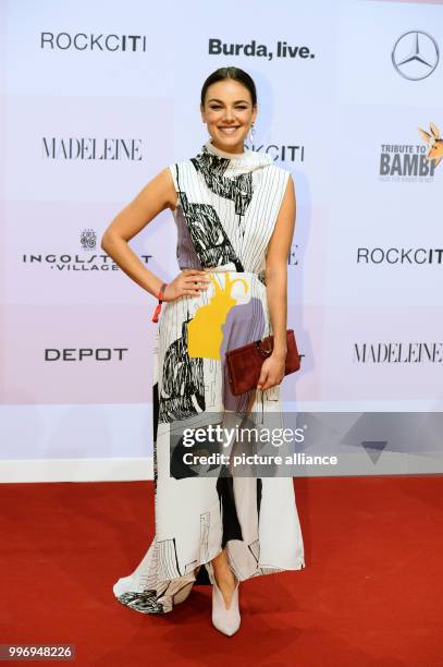 Actress Janina Uhse arrives at the charity gala 'Tribute to Bambi' in Berlin, Germany, 5 October 2017. Photo: Gregor Fischer/dpa