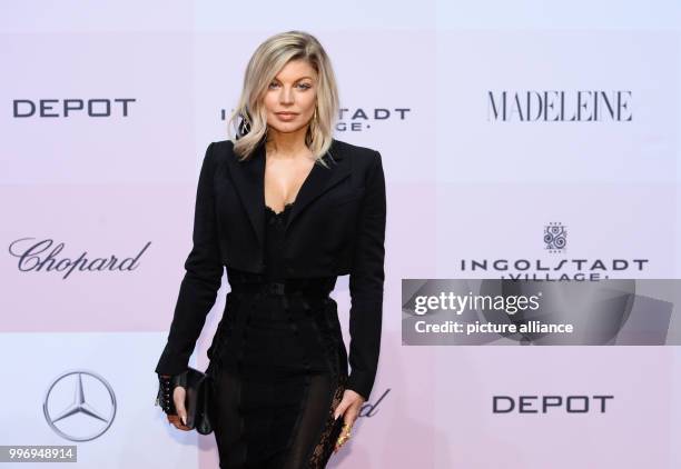 American singer Fergie Duhamel arrives at the charity gala 'Tribute to Bambi' in Berlin, Germany, 5 October 2017. Photo: Gregor Fischer/dpa