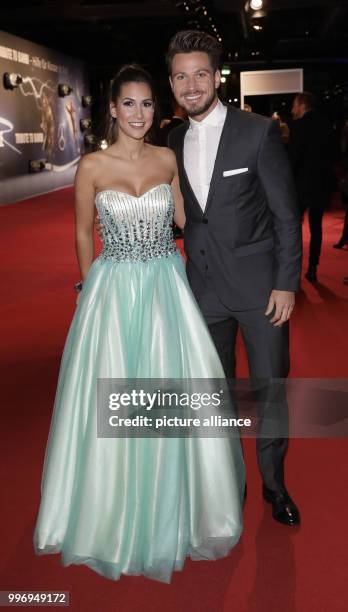 Sebastian Pannek and his girlfriend Clea-Lacy arrive at the charity gala 'Tribute to Bambi' in Berlin, Germany, 5 October 2017. Photo: Jörg...