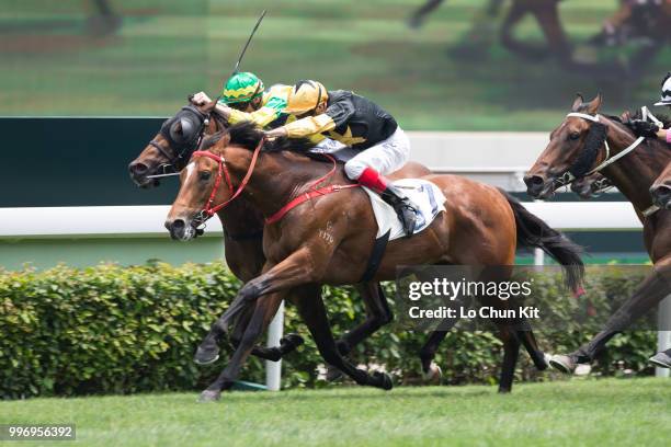 Jockey Hugh Bowman riding Run Forrest wins Race 2 Audemars Piguet Lady Royal Oak Handicap at Sha Tin racecourse on April 26 , 2015 in Hong Kong.