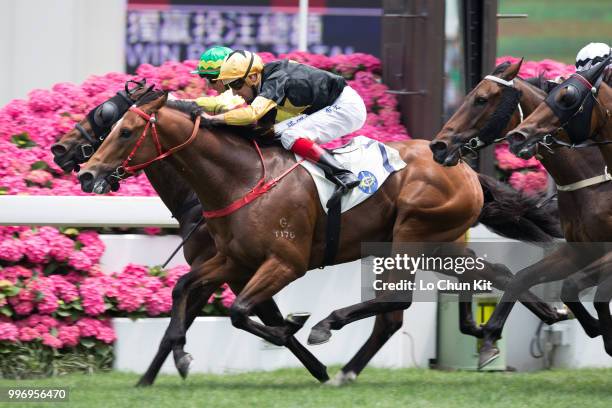 Jockey Hugh Bowman riding Run Forrest wins Race 2 Audemars Piguet Lady Royal Oak Handicap at Sha Tin racecourse on April 26 , 2015 in Hong Kong.