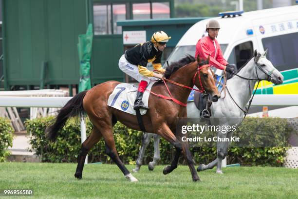 Jockey Hugh Bowman riding Run Forrest wins Race 2 Audemars Piguet Lady Royal Oak Handicap at Sha Tin racecourse on April 26 , 2015 in Hong Kong.