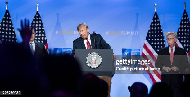 July 2018, Brussels, Belgium: Donald Trump, President of The United States, together with US Foreign Minister Mike Pompeo , and John Bolton, Security...