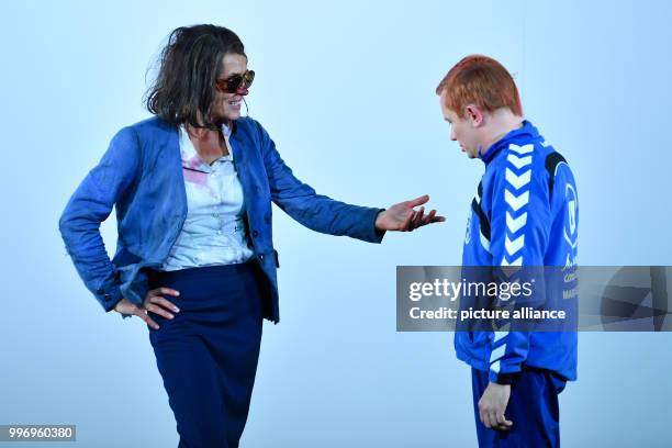 Ulrike Folkerts as Cookie Close and Sven Prietz as the young man can be seen on stage during a photo rehearsal of the theatre piece "Fuer immer...