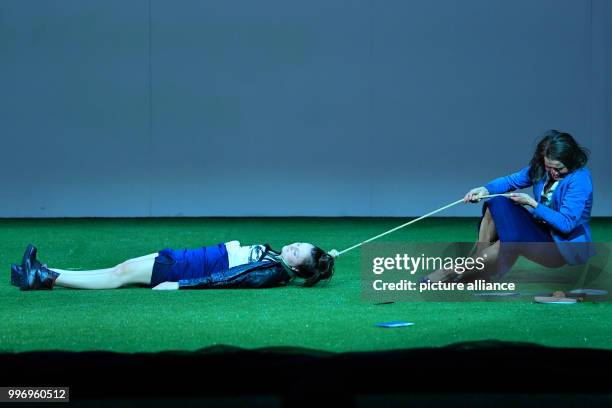 Ulrike Folkerts as Cookie Close and Celina Rongen as Dawn can be seen on stage during a photo rehearsal of the theatre piece "Fuer immer schoen" at...