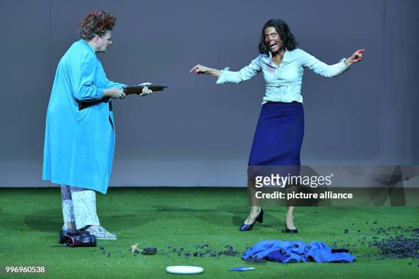 Ulrike Folkerts as Cookie Close and Anke Schubert as a woman can be seen on stage during a photo rehearsal of the theatre piece "Fuer immer schoen"...