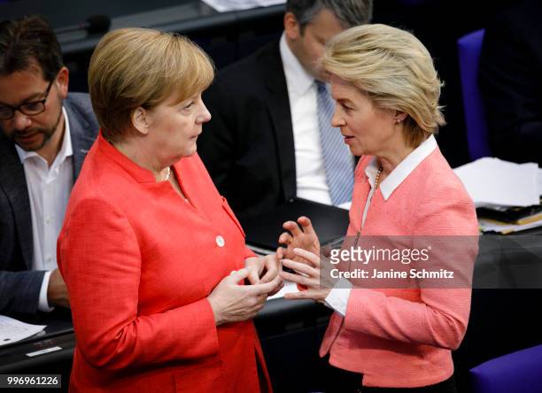 German Chancellor Angela Merkel and German Defense Minister Ursula von der Leyen are pictured during a conversation at the Plenary Session of the...