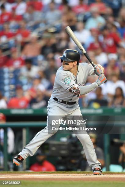 Derek Dietrich of the Miami Marlins prepares for a pitch during a baseball game against the Washington Nationals at Nationals Park on July 5, 2018 in...