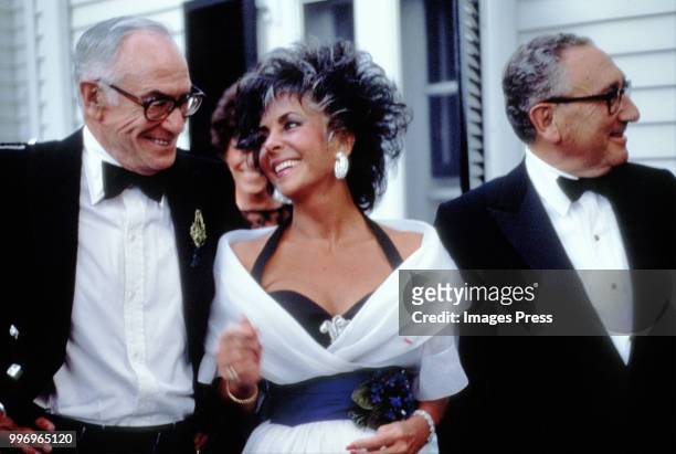 Malcolm Forbes, Elizabeth Taylor and Henry Kissinger circa 1987 in New Jersey.
