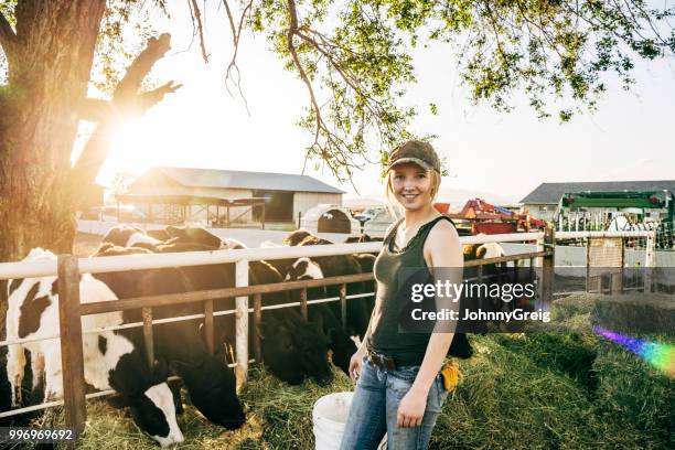 farm life - portrait of young american agricultural worker - female farmer stock pictures, royalty-free photos & images