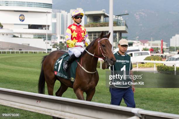 Jockey Joao Moreira riding Designs On Rome during Race 8 Audemars Piguet Queen Elizabeth II Cup at Sha Tin racecourse on April 26 , 2015 in Hong Kong.
