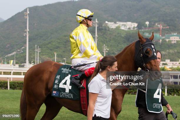 Jockey Craig Williams riding Criterion during Race 8 Audemars Piguet Queen Elizabeth II Cup at Sha Tin racecourse on April 26 , 2015 in Hong Kong.