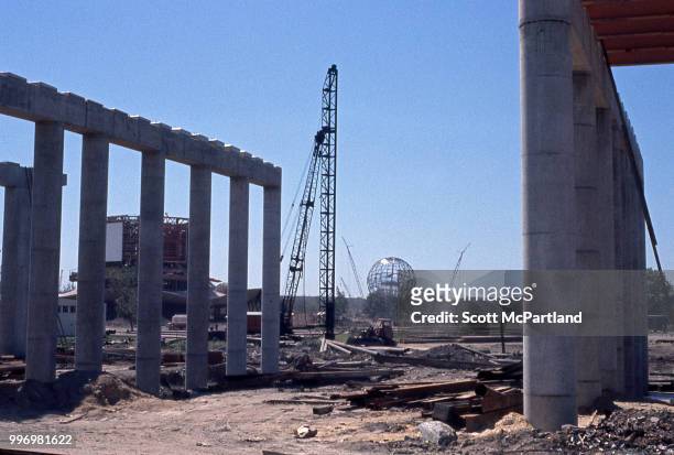 View of the muddy construction site for the 1964/1965 World's Fair in Corona, Queens, New York, New York, July 1, 1963. Visible in the center...