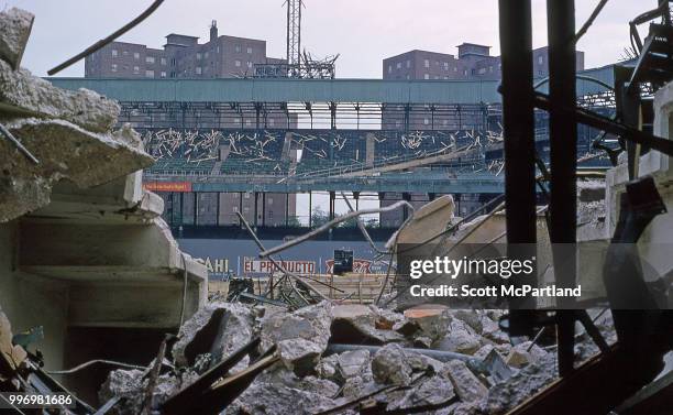 View, over rubble piles, during the demolition at the Polo Grounds stadium in Upper Manhattan, New York, New York, June 1, 1964.