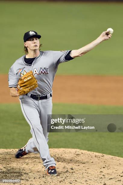 Adam Conley of the Miami Marlins pitches during a baseball game against the Washington Nationals at Nationals Park on July 5, 2018 in Washington, DC....