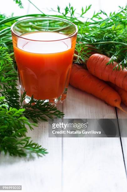 vegetable juice - ベビーキャロット ストックフォトと画像