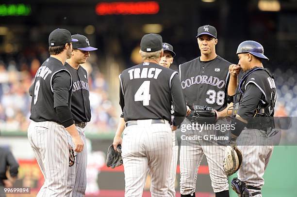 Ubaldo Jimenez of the Colorado Rockies is taken out of the game by Manager Jim Tracy against the Washington Nationals at Nationals Park on April 22,...