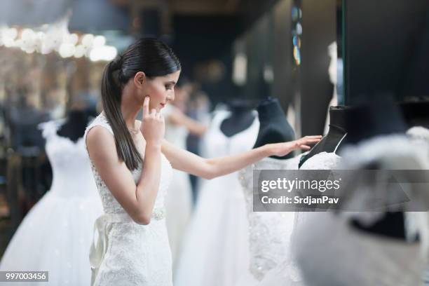 searching for that special dress - moment collection stock pictures, royalty-free photos & images