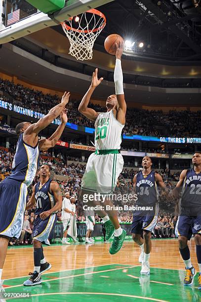 Ray Allen of the Boston Celtics puts the ball up against the Memphis Grizzlies on March 10, 2010 at the TD Garden in Boston, Massachusetts. NOTE TO...
