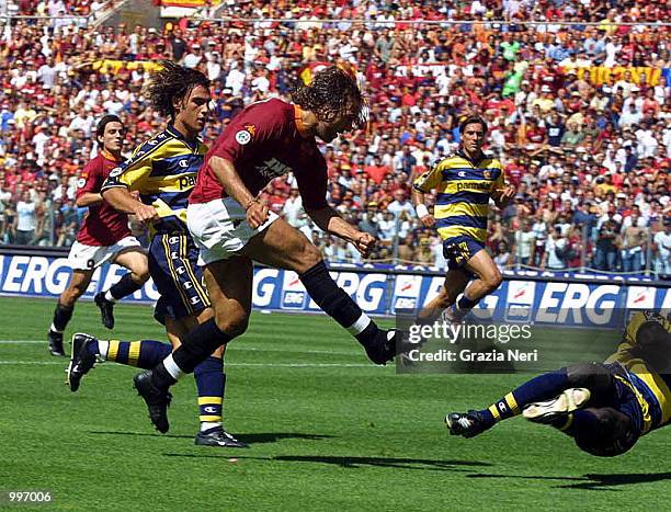 Gabriel Batistuta shoots at goal with Montella waiting in the background to score from the rebound during the Serie A 34th Round League match played...