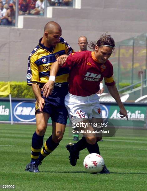 Francesco Totti of Roma and Marco Di Vaio of Parma in action during the Serie A 34th Round League match played between Roma and Parma, played at the...