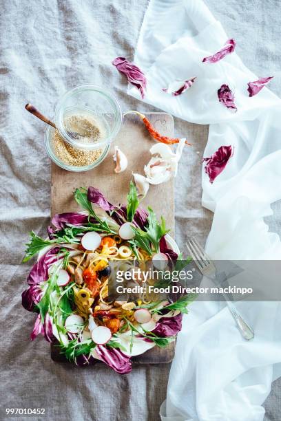 vegetable & sesami pasta - chrysanthemum parthenium stock pictures, royalty-free photos & images