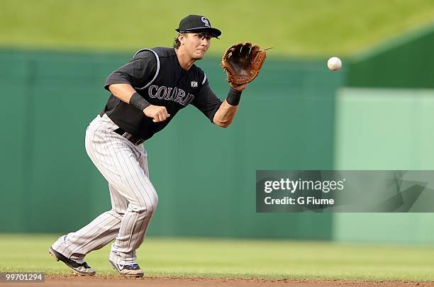 Troy Tulowitzki of the Colorado Rockies fields the ball against the Washington Nationals at Nationals Park on April 22, 2010 in Washington, DC.