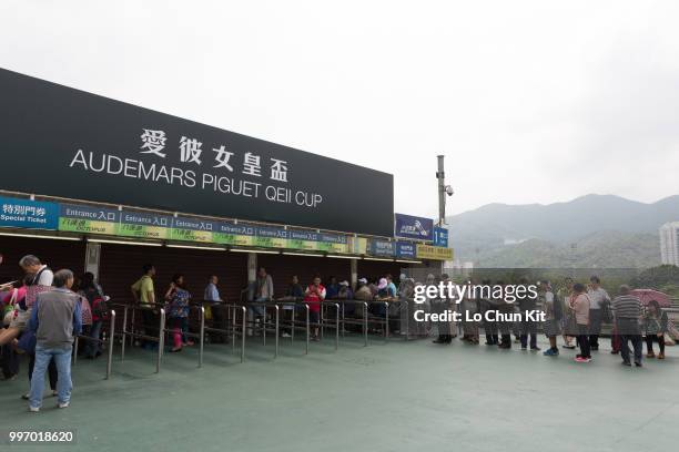 People going to Sha Tin Racecourse during Audemars Piguet Queen Elizabeth II Cup race day on April 26 , 2015 in Hong Kong.