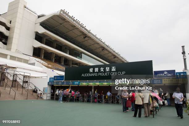 People going to Sha Tin Racecourse during Audemars Piguet Queen Elizabeth II Cup race day on April 26 , 2015 in Hong Kong.