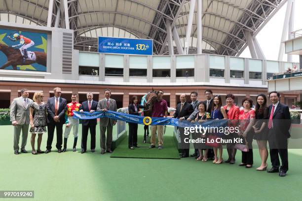 All attending guests take a photo with Ambitious Dragon at the ceremony at Sha Tin racecourse on April 26 , 2015 in Hong Kong.