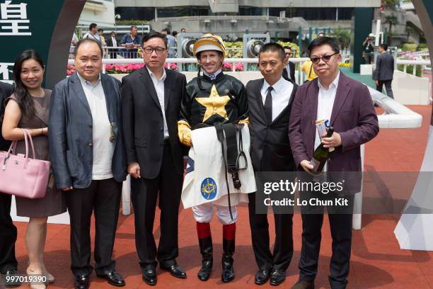 Jockey Hugh Bowman, trainer Danny Shum Chap-shing and owners celebrate after Run Forrest winning Race 2 Audemars Piguet Lady Royal Oak Handicap at...