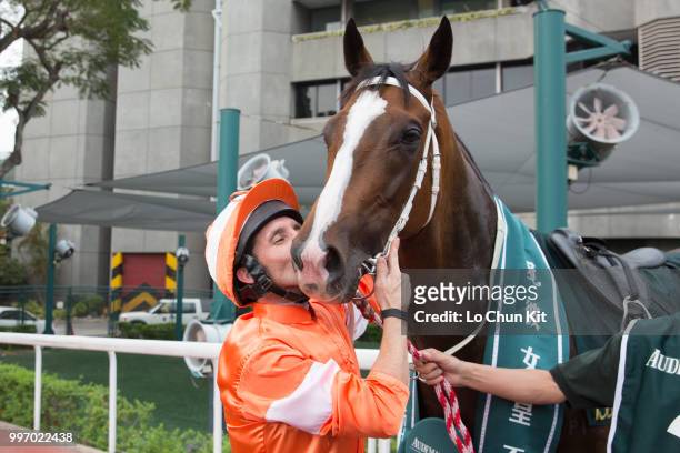 Jockey Neil Callan kisses Blazing Speed after winning Race 8 Audemars Piguet Queen Elizabeth II Cup at Sha Tin racecourse on April 26 , 2015 in Hong...