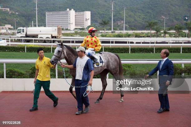Jockey Douglas Whyte riding Giant Treasure wins Race 9 Audemars Piguet Jules Audemars Handicap at Sha Tin racecourse on April 26 , 2015 in Hong Kong.