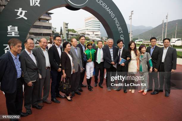 Jockey Karis Teetan, owner Infinitude Syndicate and trainer Ricky Yiu celebrate after Blizzard winning the Race 10 Audemars Piguet Lady Jules...