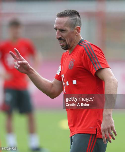 Franck Ribery of FC Bayern Muenchen gestures during a training session at the club's Saebener Strasse training ground on July 12, 2018 in Munich,...