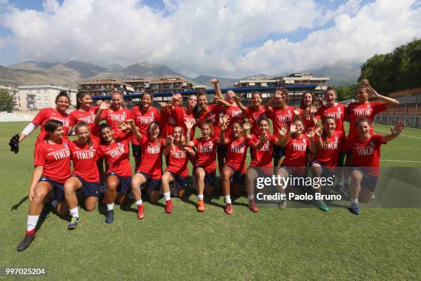 Italian players pose during the Italy women U19 photocall and training session on July 12, 2018 in Formia, Italy.