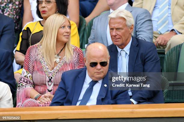 Bjorn Borg and his wife Patricia Ostfeldt attend day ten of the Wimbledon Tennis Championships at the All England Lawn Tennis and Croquet Club on...