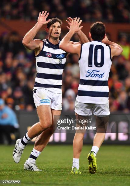 Tom Hawkins of the Cats celebrates after kicking a goal during the round 17 AFL match between the Adelaide Crows and the Geelong Cats at Adelaide...