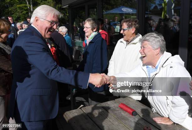 Federal president Frank-Walter Steinmeier greets people at the market in Sehestedt, Germany, 6 January 2017. During his two day visit Steinmeier has...