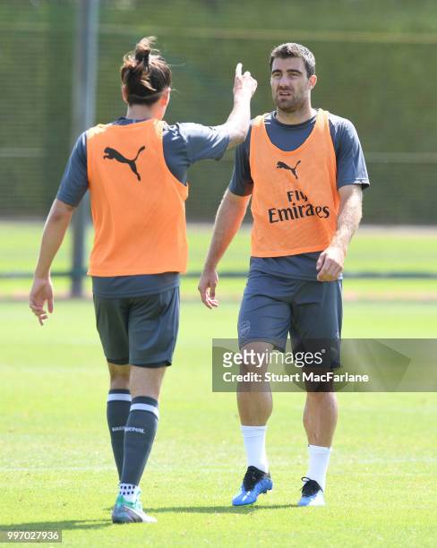 Hector Bellerin and Sokratis of Arsenal during a training session at London Colney on July 12, 2018 in St Albans, England.