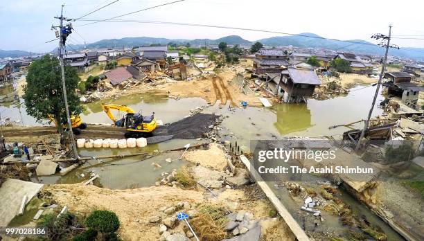 Floodwaters remain after water recede on July 12, 2018 in Kurashiki, Okayama, Japan. The death toll from the torrential rain in western Japan due to...