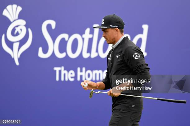 Rickie Fowler of USA reacts to his putt on hole eighteen during day one of the Aberdeen Standard Investments Scottish Open at Gullane Golf Course on...