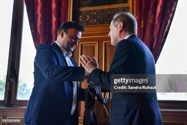 Jean Francois Martins, deputy mayor of Paris in charge of sport and David Kahn, CEO of Paris Basketball Investments during the press conference of...