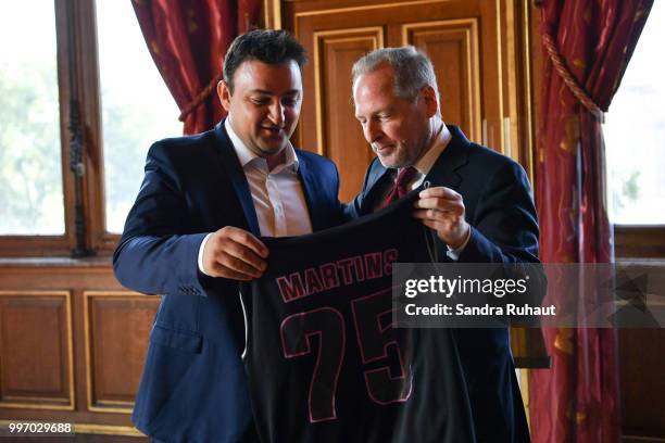 Jean Francois Martins, deputy mayor of Paris in charge of sport and David Kahn, CEO of Paris Basketball Investments during the press conference of...