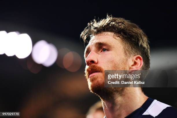 Zach Tuohy of the Cats walks from the ground after the round 17 AFL match between the Adelaide Crows and the Geelong Cats at Adelaide Oval on July...