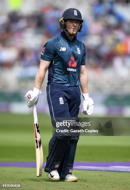 England captain Eoin Morgan leaves the field after being dismissed by Yuzvendra Chahal of India during the Royal London One-Day match between England...