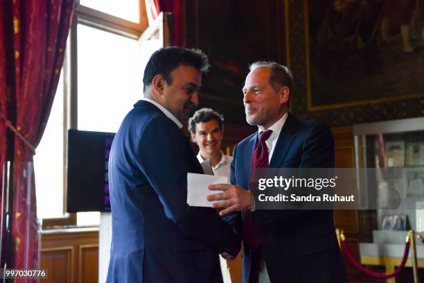 Jean Francois Martins, deputy mayor of Paris in charge of sport and David Kahn, CEO of Paris Basketball Investments during the press conference of...